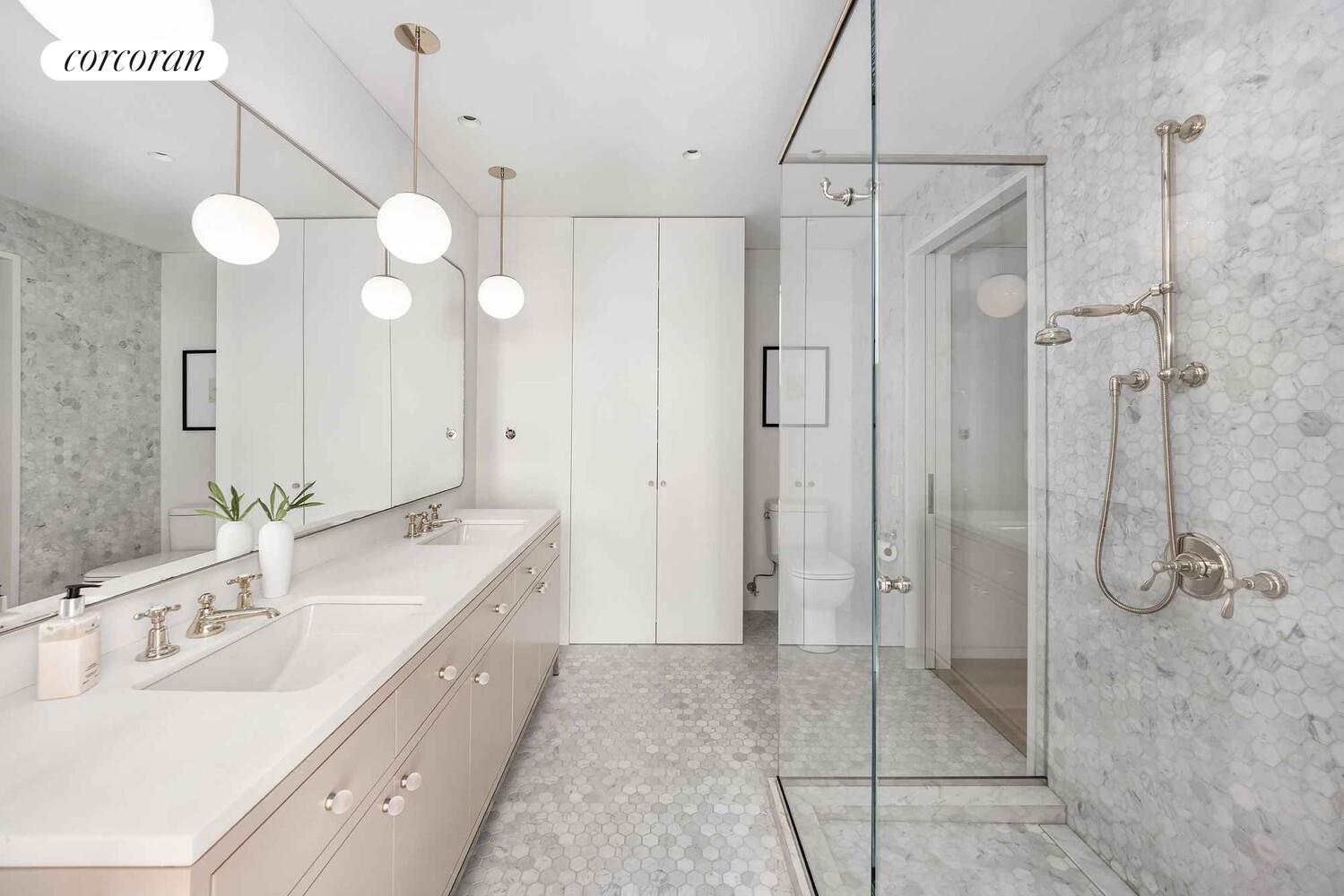 37 Warren Street, Unit PHCD Manhattan, NY 10007 - Photo 17 of 23 a spacious bathroom with a double vanity sink mirror and shower