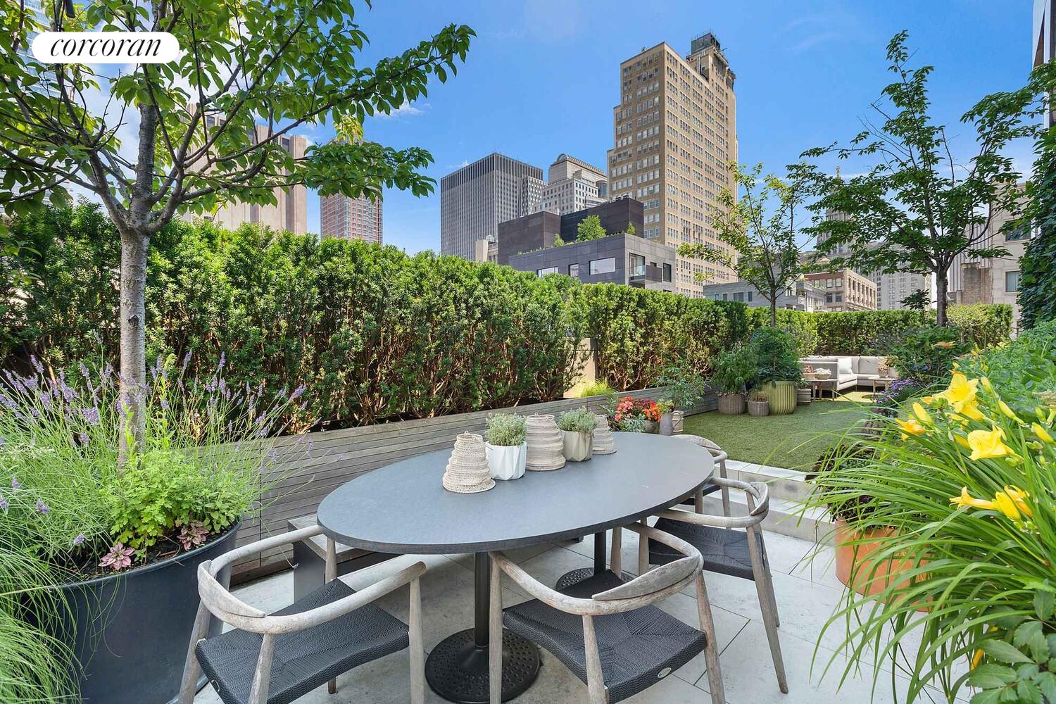 37 Warren Street, Unit PHCD Manhattan, NY 10007 - Photo 19 of 23 a view of a house with backyard and sitting area