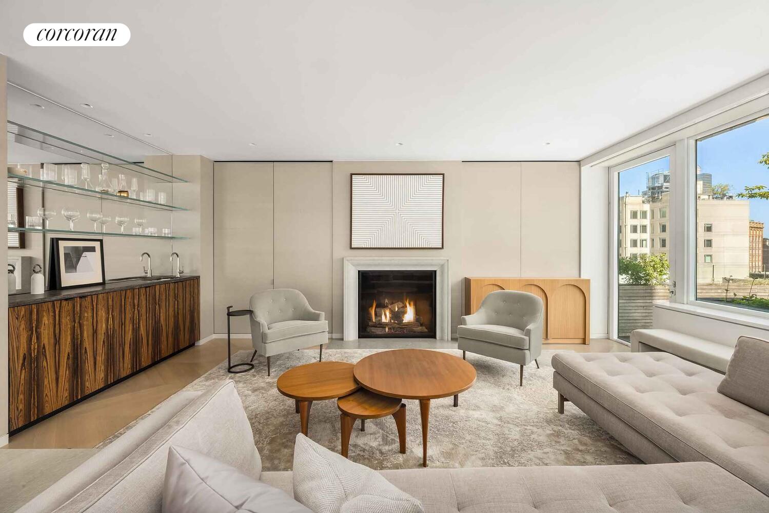 37 Warren Street, Unit PHCD Manhattan, NY 10007 - Photo 2 of 23 a living room with furniture and a fireplace