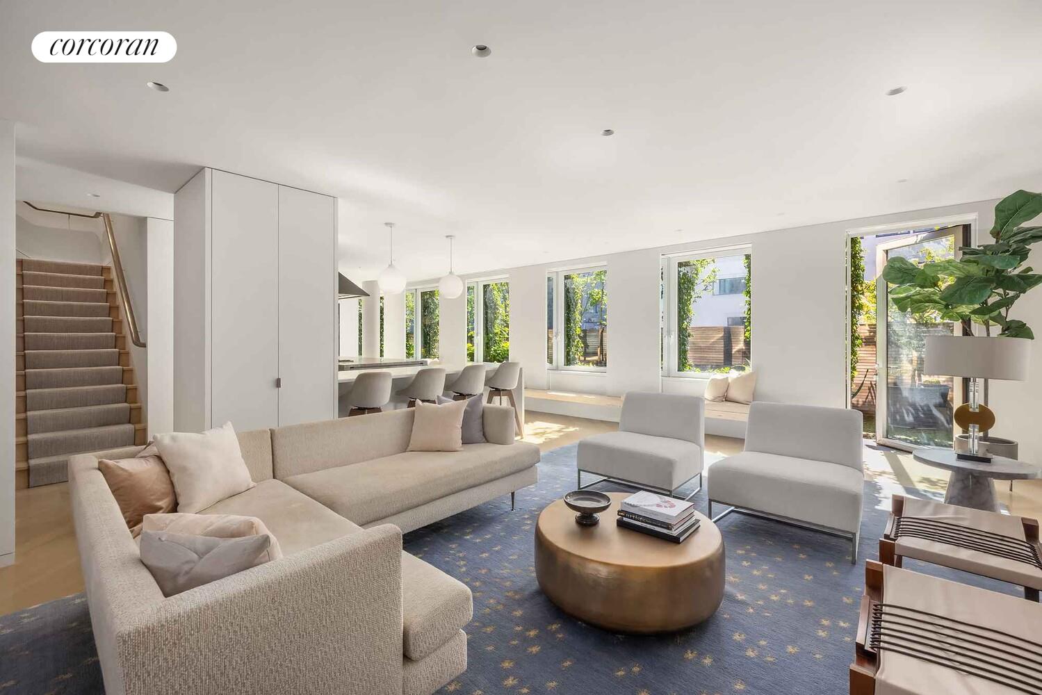 37 Warren Street, Unit PHCD Manhattan, NY 10007 - Photo 7 of 23 a living room with furniture and a large window