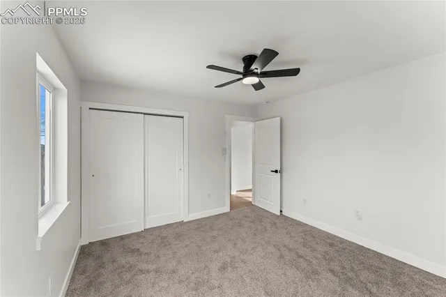 a view of a big room with carpet