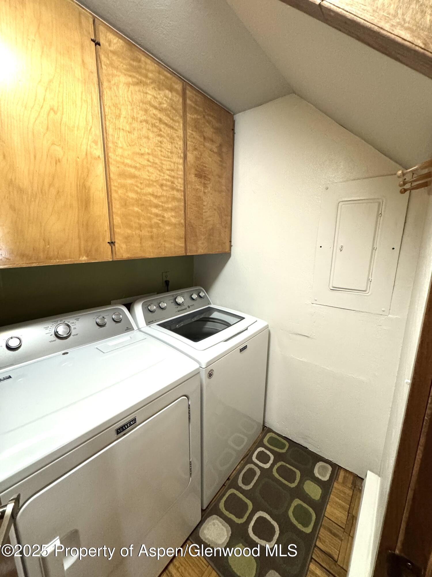 125 East Hyman Avenue, Unit 1A Aspen, CO 81611 - Photo 12 of 19 a utility room with dryer and washer
