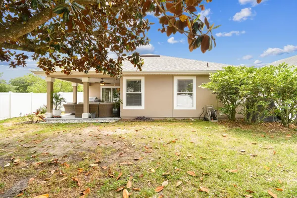 a bathroom with a toilet a sink and storage