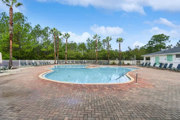 a view of an outdoor space and tennis court