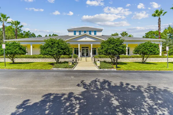 a aerial view of a house with a lake view