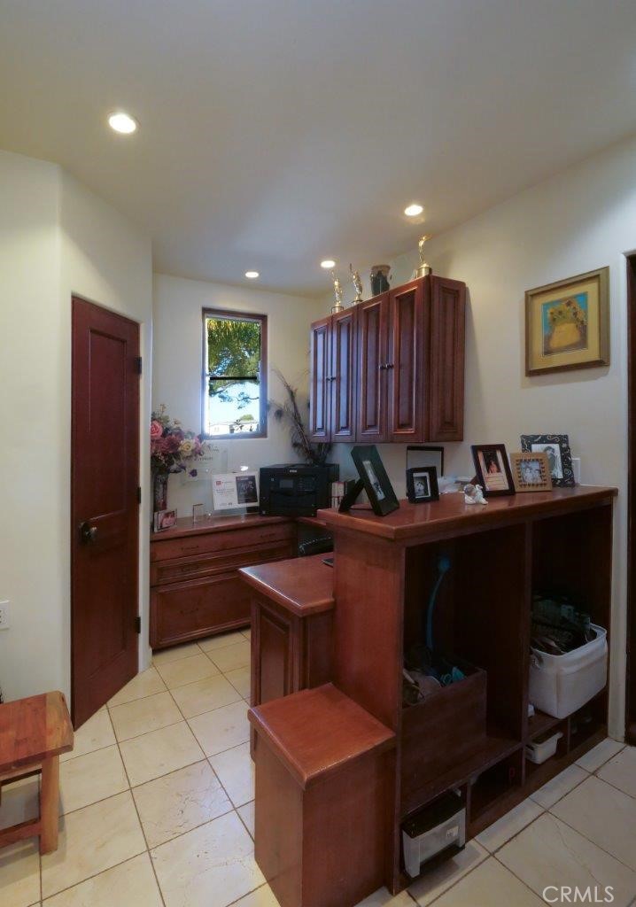 1724 Vía Estudillo Palos Verdes Estates, CA 90274 - Photo 20 of 45 a kitchen with granite countertop a refrigerator and a stove
