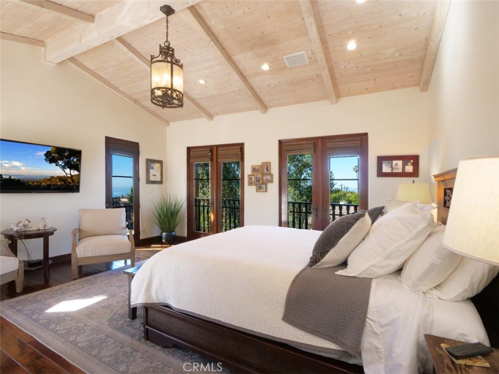1724 Vía Estudillo Palos Verdes Estates, CA 90274 - Photo 26 of 45 a bed room with a bed window and a couch