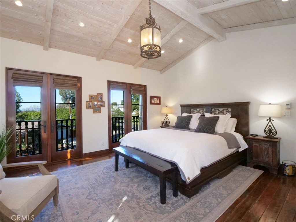 1724 Vía Estudillo Palos Verdes Estates, CA 90274 - Photo 27 of 45 a spacious bedroom with a bed and ceiling fan