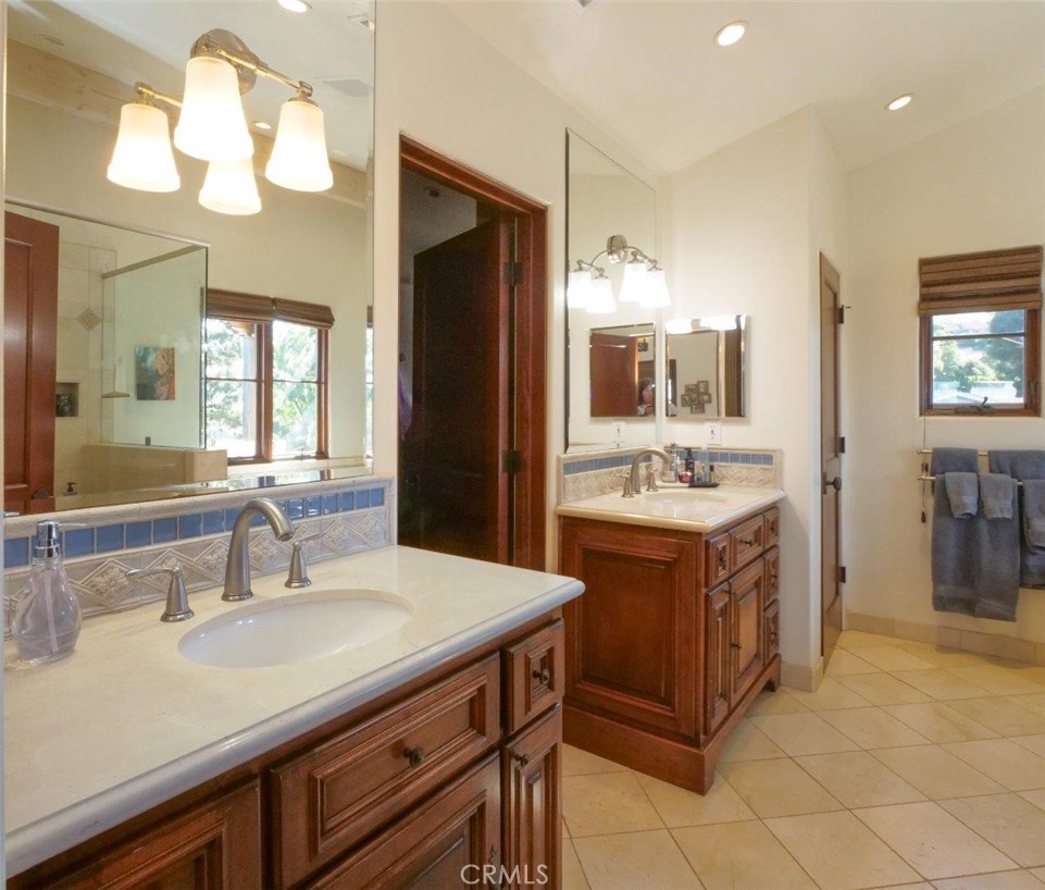 1724 Vía Estudillo Palos Verdes Estates, CA 90274 - Photo 29 of 45 a bathroom with a sink double vanity and a mirror