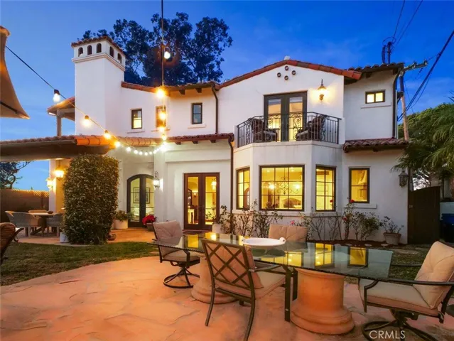 a front view of a house with swimming pool