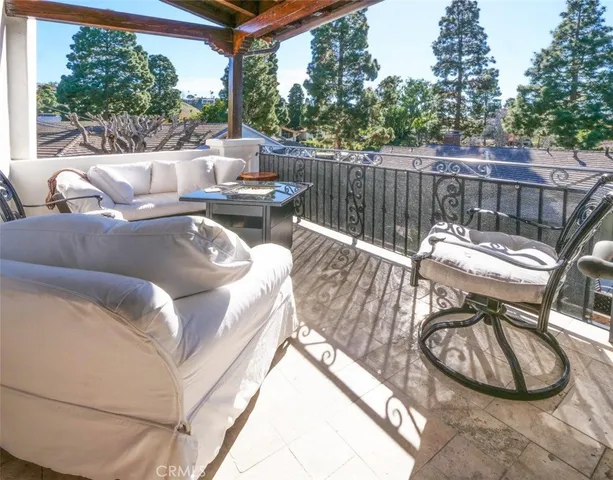 a view of a couches and table in the patio