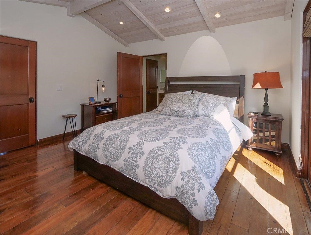 1724 Vía Estudillo Palos Verdes Estates, CA 90274 - Photo 34 of 45 a bedroom with a bed and wooden floor