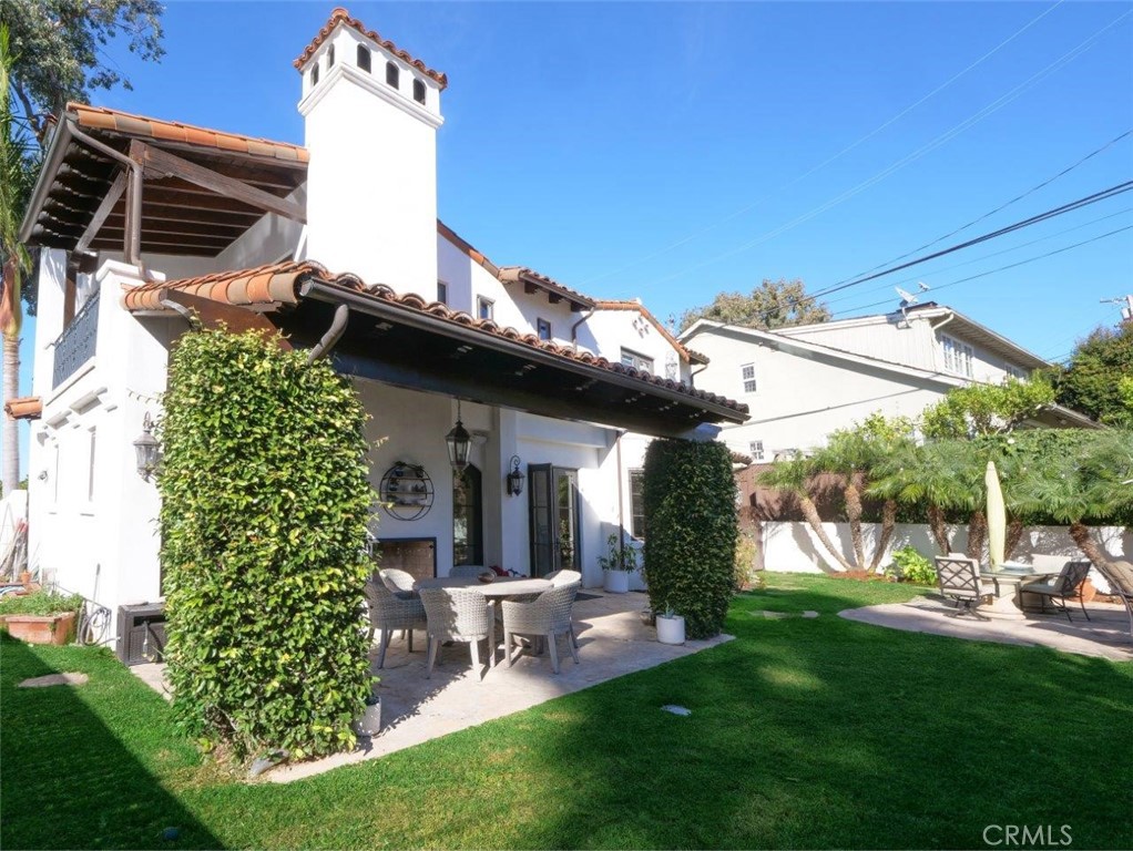 1724 Vía Estudillo Palos Verdes Estates, CA 90274 - Photo 44 of 45 a view of a chair and table in backyard of the house