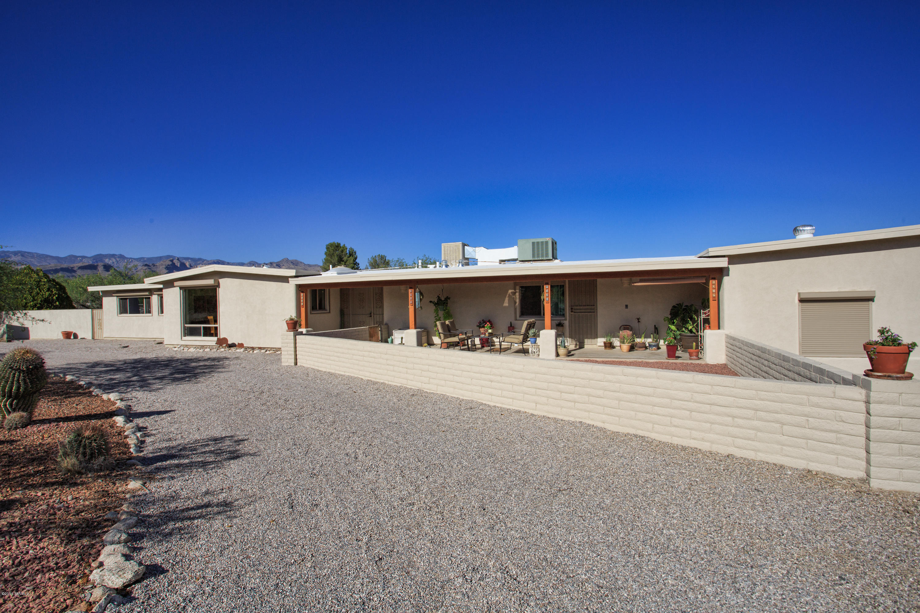 3240 North Webster Road Tucson, AZ 85750 - Photo 2 of 26 a view of a house with a yard