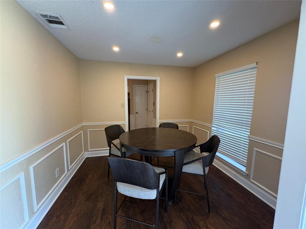 2002 Azalea Street Denton, TX 76205 - Photo 6 of 15 Comes with this dining table, this area could also double as a study area
