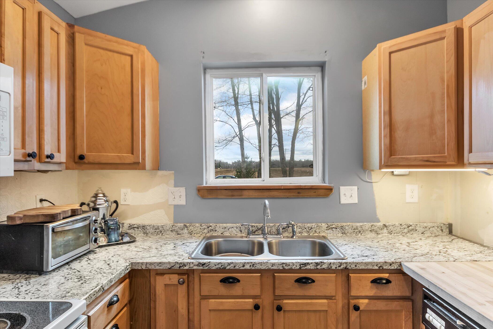 18520 West Edgar Road Howard City, MI 49329 - Photo 11 of 24 12-18520-Edgar-Rd-WindowStill-Real-Estat