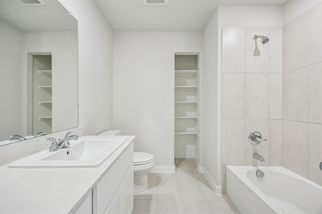 5719 Rushing River Way McKinney, TX 75071 - Photo 37 of 40 Bathroom in the Stanley II home plan by Trophy Signature Homes – REPRESENTATIVE PHOTO
