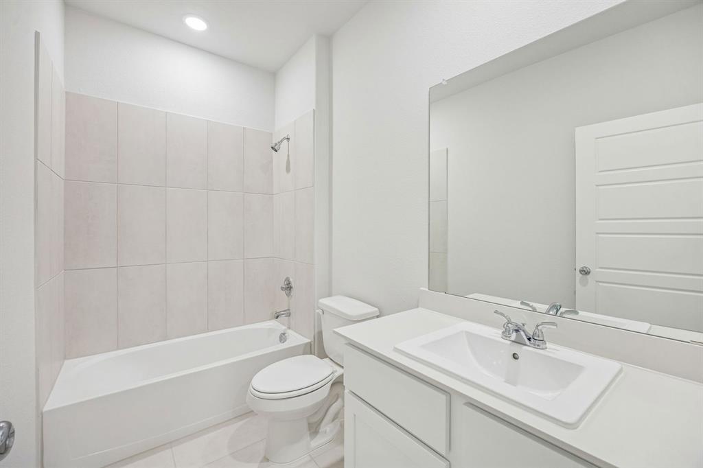 5719 Rushing River Way McKinney, TX 75071 - Photo 38 of 40 Bathroom in the Stanley II home plan by Trophy Signature Homes – REPRESENTATIVE PHOTO