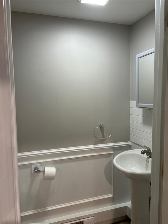 137 Westboro Road Grafton, MA 01536 - Photo 11 of 28 a bathroom with a sink and a toilet