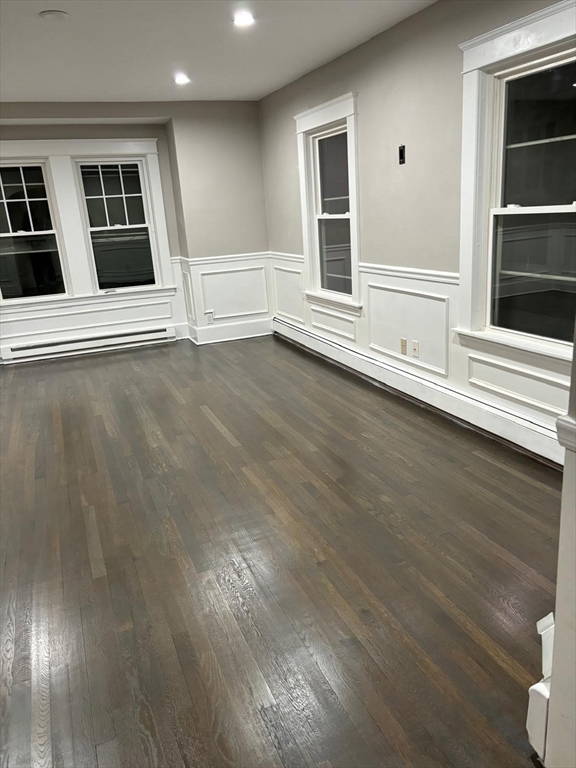 137 Westboro Road Grafton, MA 01536 - Photo 16 of 28 an empty room with wooden floor and windows