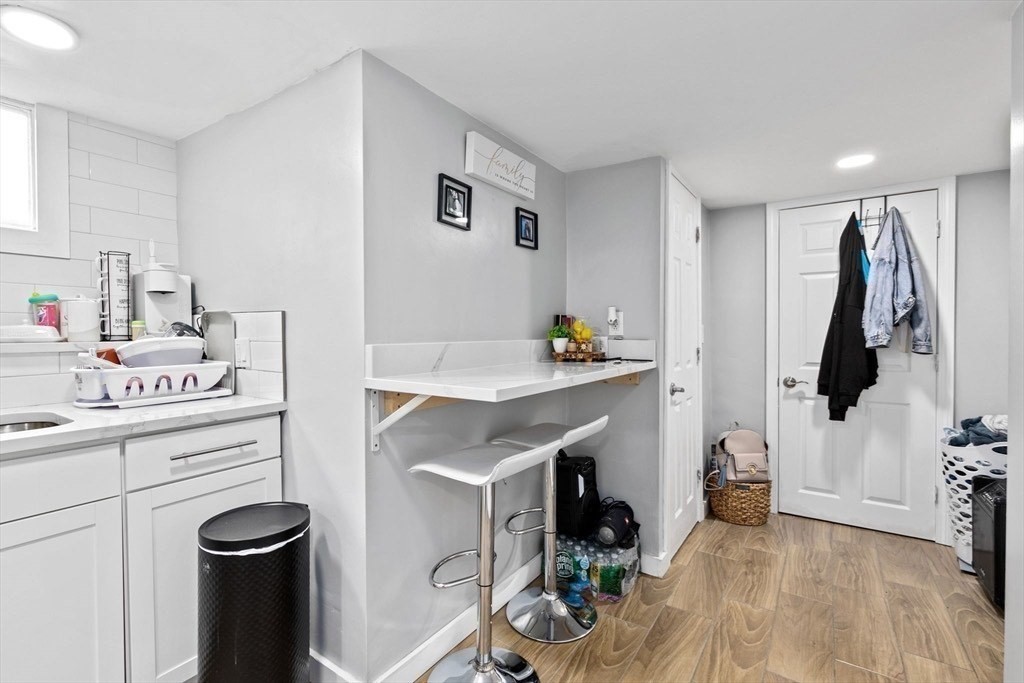 137 Westboro Road Grafton, MA 01536 - Photo 22 of 28 a kitchen with appliances cabinets and a sink
