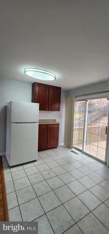 a view of a livingroom with a furniture and window