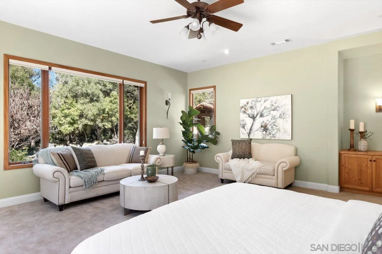 11760 Betsworth Road Valley Center, CA 92082 - Photo 28 of 47 a living room with furniture and a large window