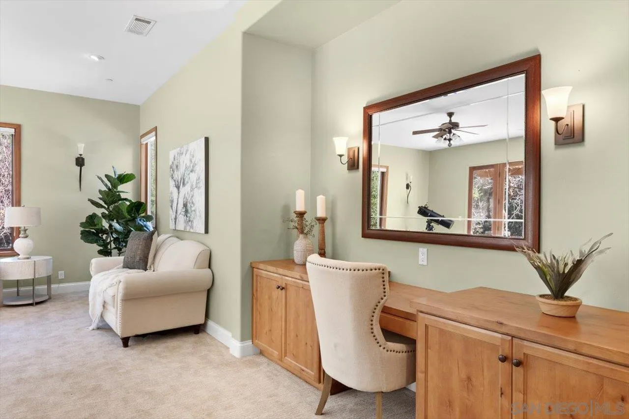 11760 Betsworth Road Valley Center, CA 92082 - Photo 29 of 47 a living room with furniture and a potted plant