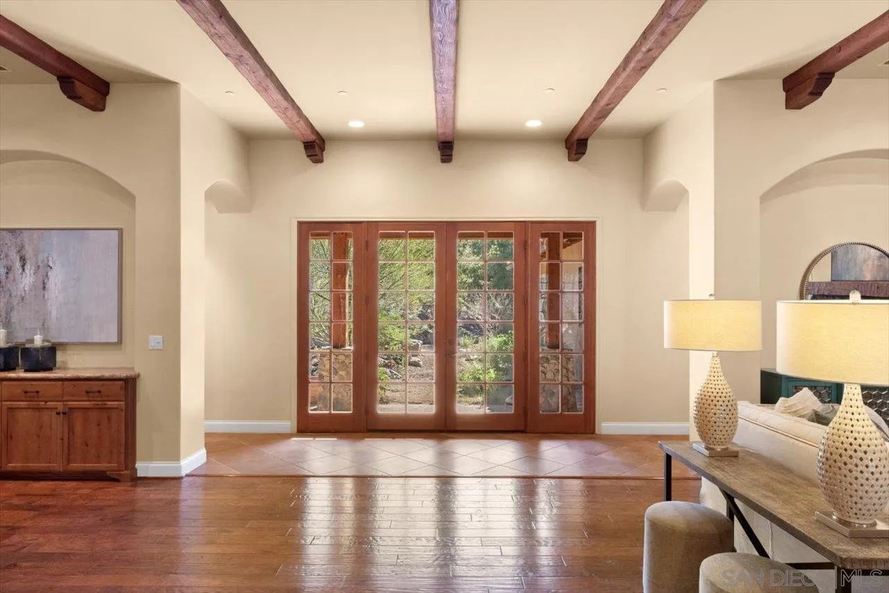 11760 Betsworth Road Valley Center, CA 92082 - Photo 31 of 47 a living room with furniture and a large window