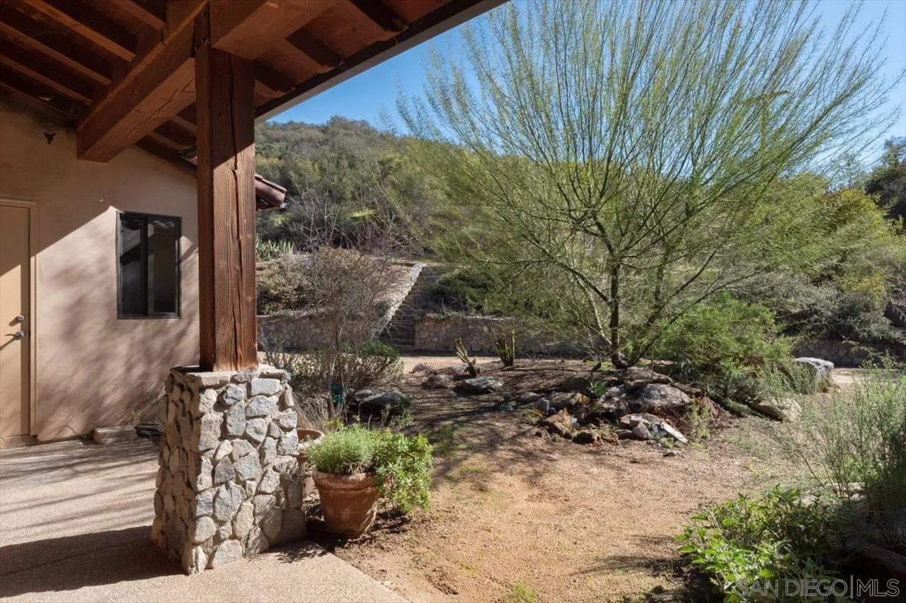 11760 Betsworth Road Valley Center, CA 92082 - Photo 34 of 47 a backyard of a house with outdoor seating