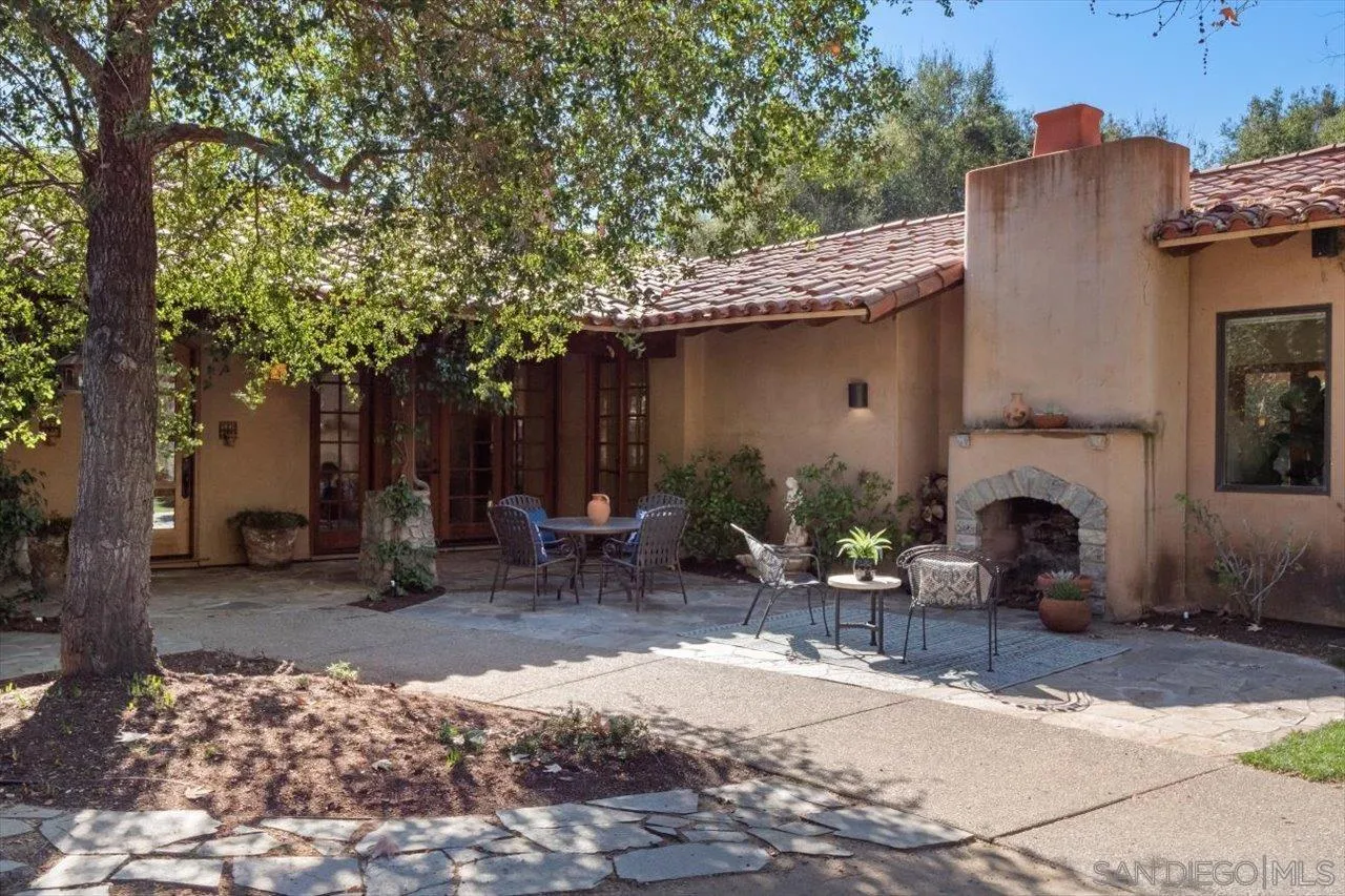 11760 Betsworth Road Valley Center, CA 92082 - Photo 37 of 47 a view of a patio with table and chairs and a barbeque