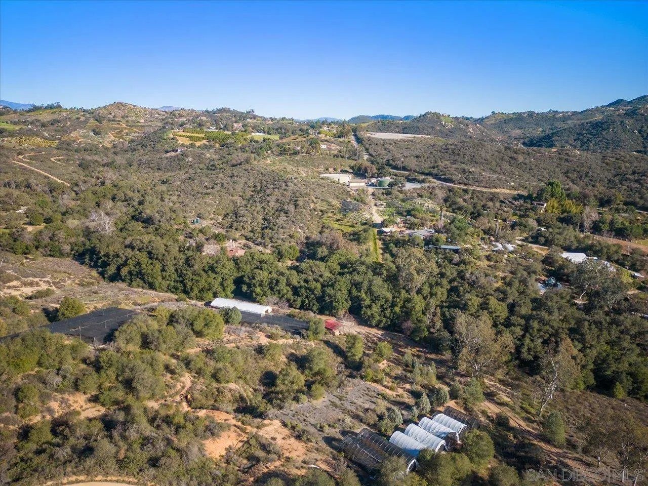 11760 Betsworth Road Valley Center, CA 92082 - Photo 40 of 47 a view of a forest with mountains in the background