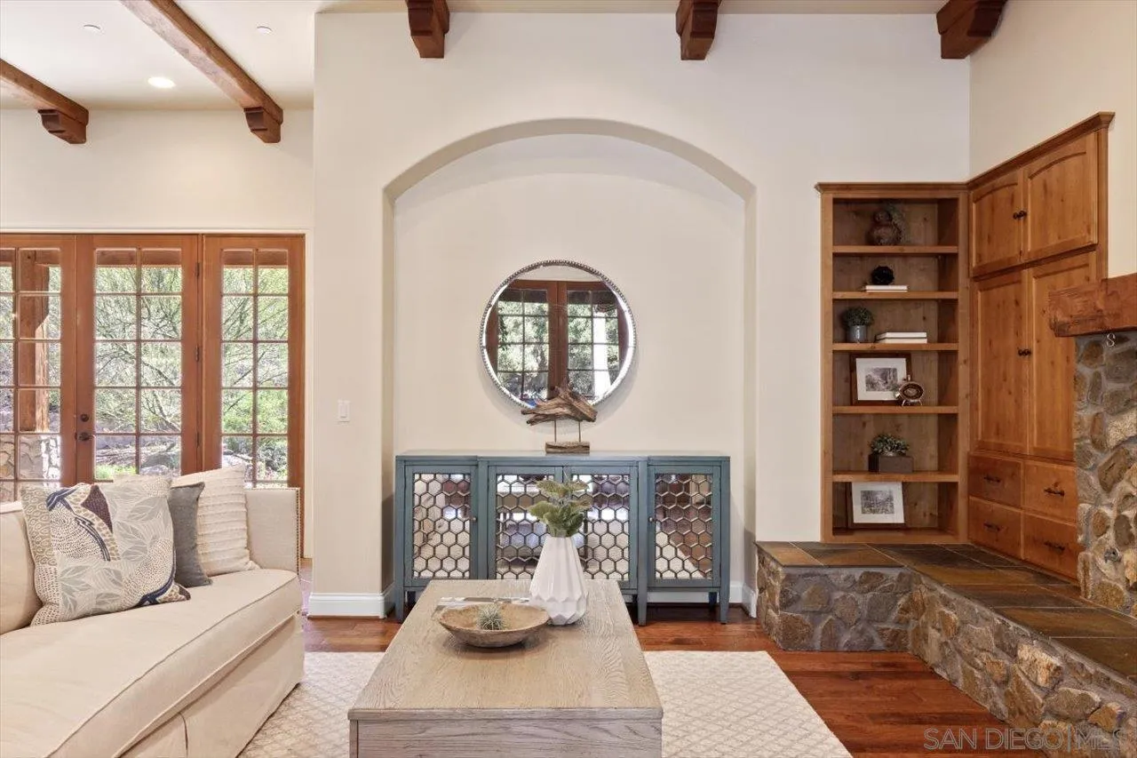11760 Betsworth Road Valley Center, CA 92082 - Photo 4 of 47 a living room with furniture a rug and a large window