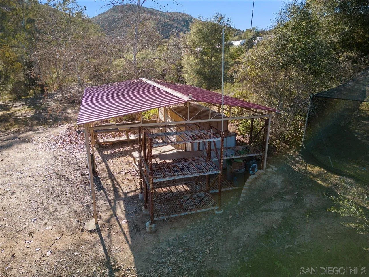 11760 Betsworth Road Valley Center, CA 92082 - Photo 45 of 47 a view of a backyard with a deck and a garden