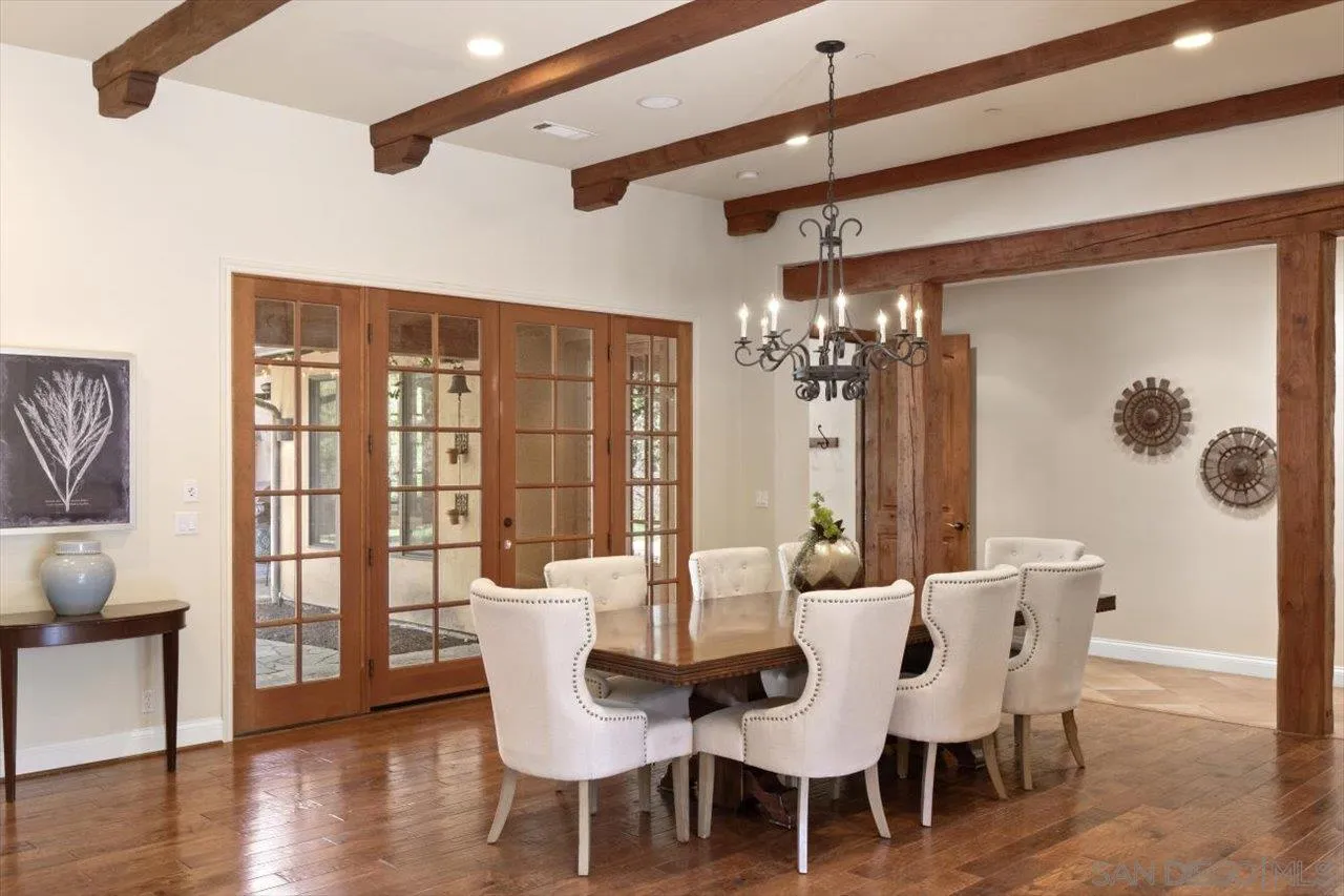 11760 Betsworth Road Valley Center, CA 92082 - Photo 5 of 47 a view of a dining room with furniture window and wooden floor