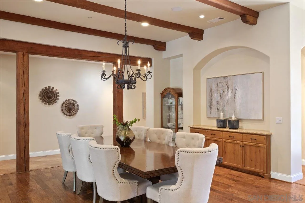 11760 Betsworth Road Valley Center, CA 92082 - Photo 6 of 47 a view of a dining room with furniture wooden floor and a chandelier