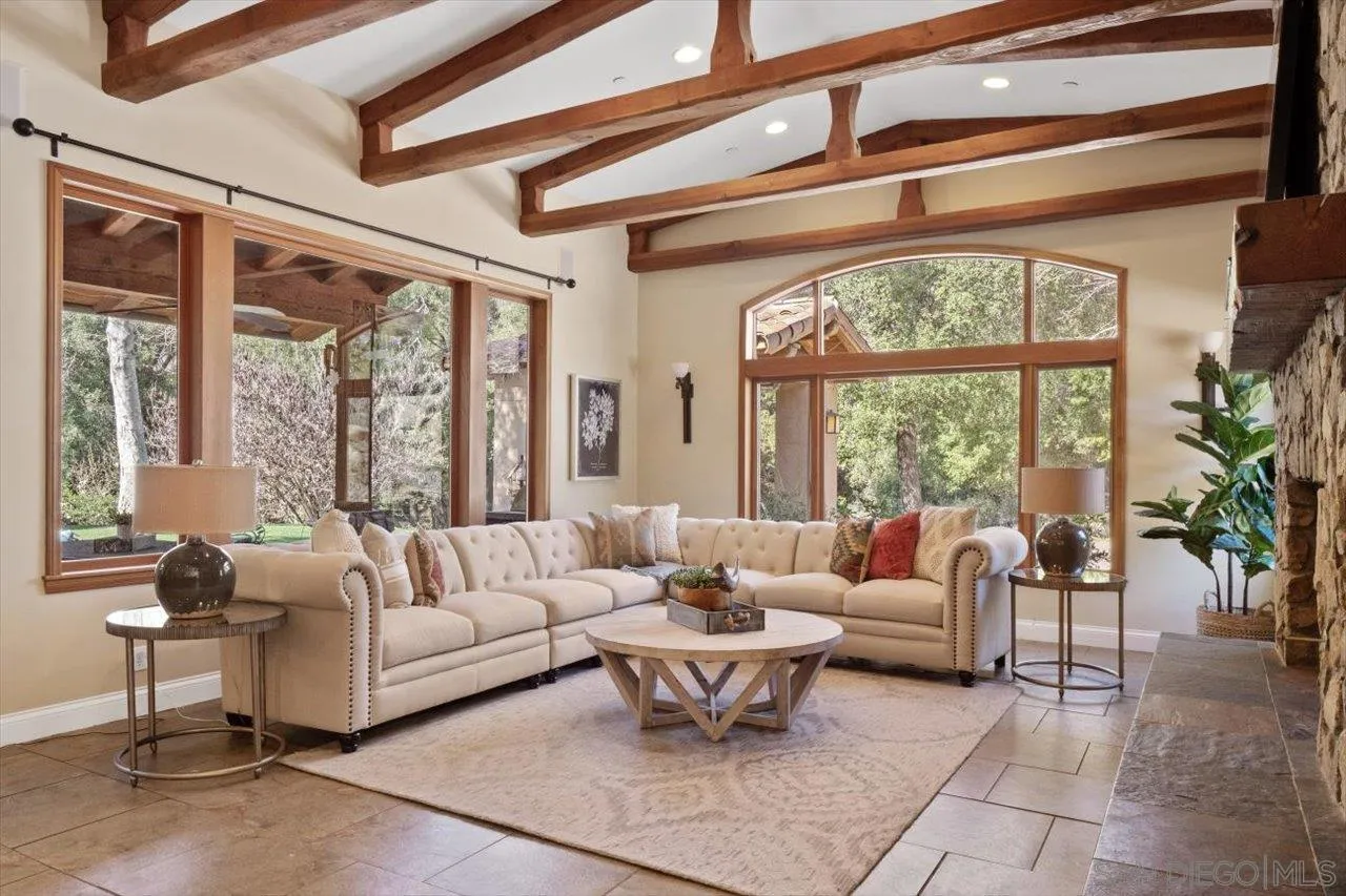 11760 Betsworth Road Valley Center, CA 92082 - Photo 8 of 47 a living room with furniture and a large window