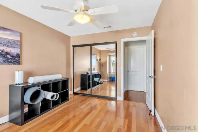 a view of a livingroom with furniture and a flat screen tv