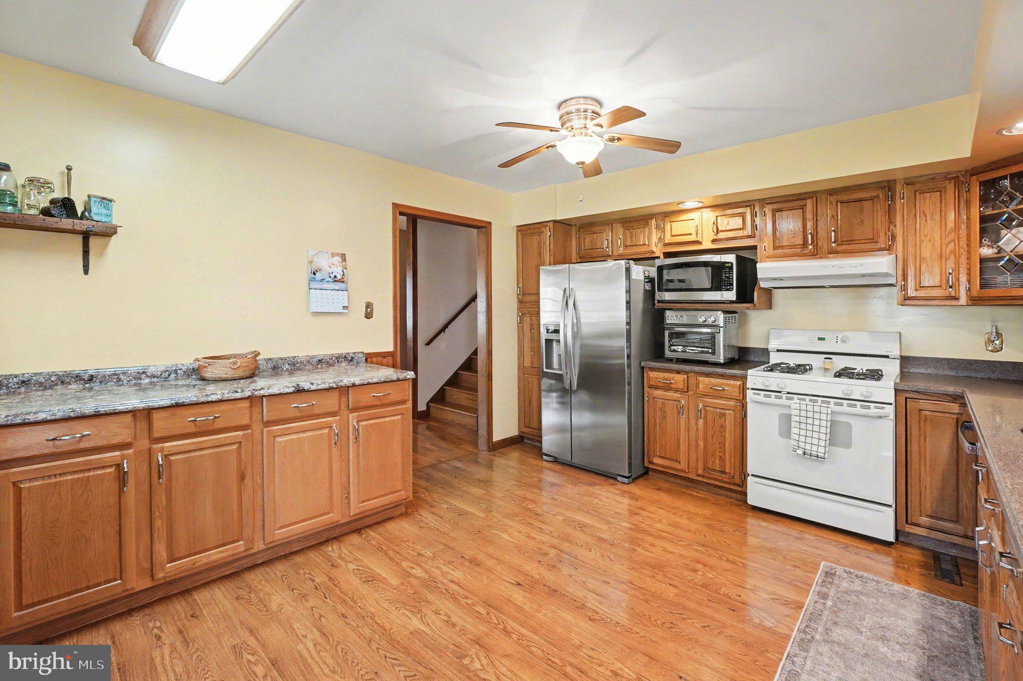 72 Cynthia Court Elkton, MD 21921 - Photo 13 of 61 Propane Cooking- Laminate Floors in Kitchen-Pantry