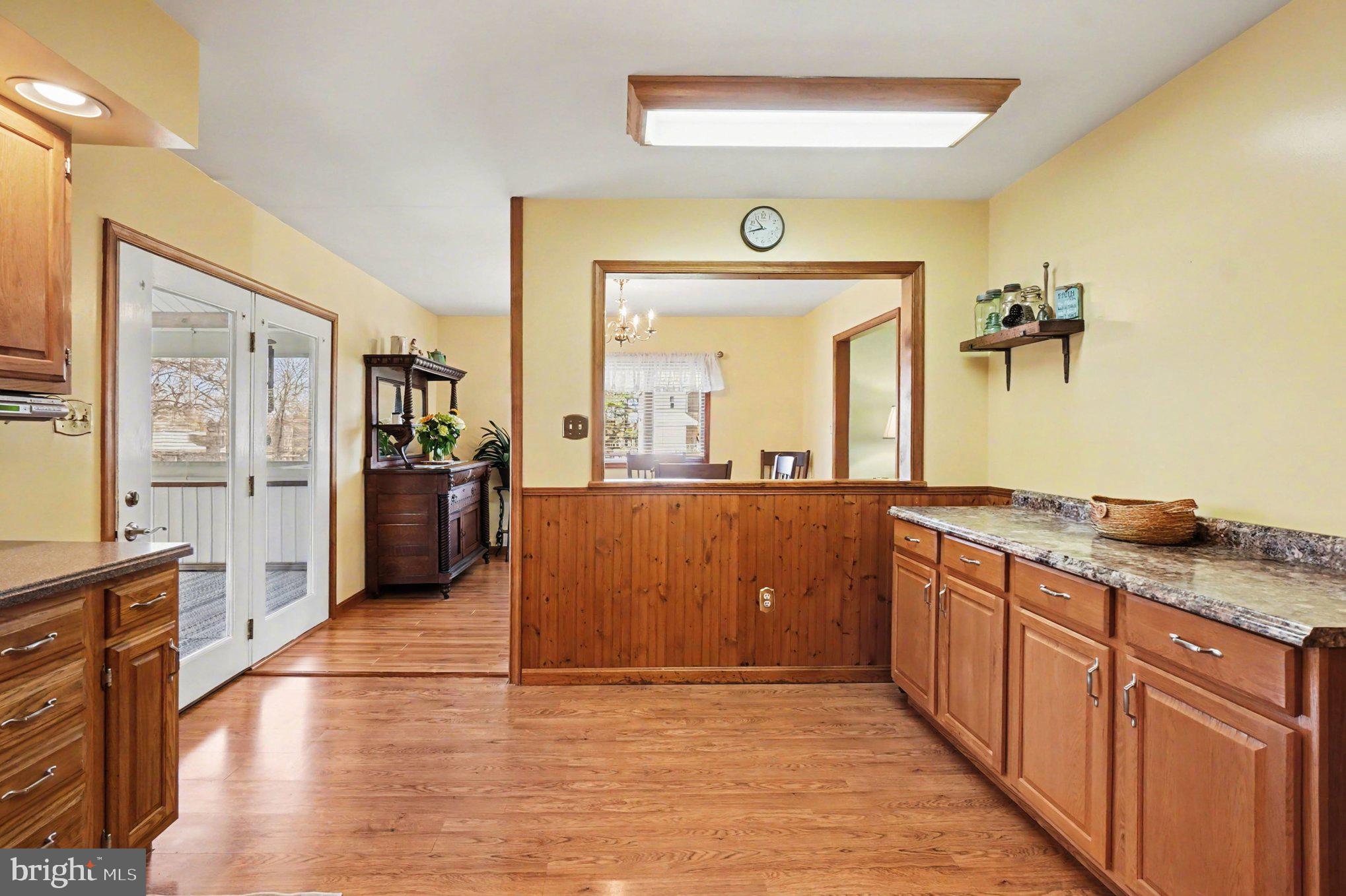72 Cynthia Court Elkton, MD 21921 - Photo 17 of 61 Dining Room Pass Thru-Striking Wainscoting