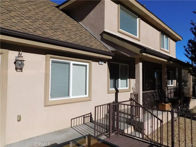 a view of a house with a balcony