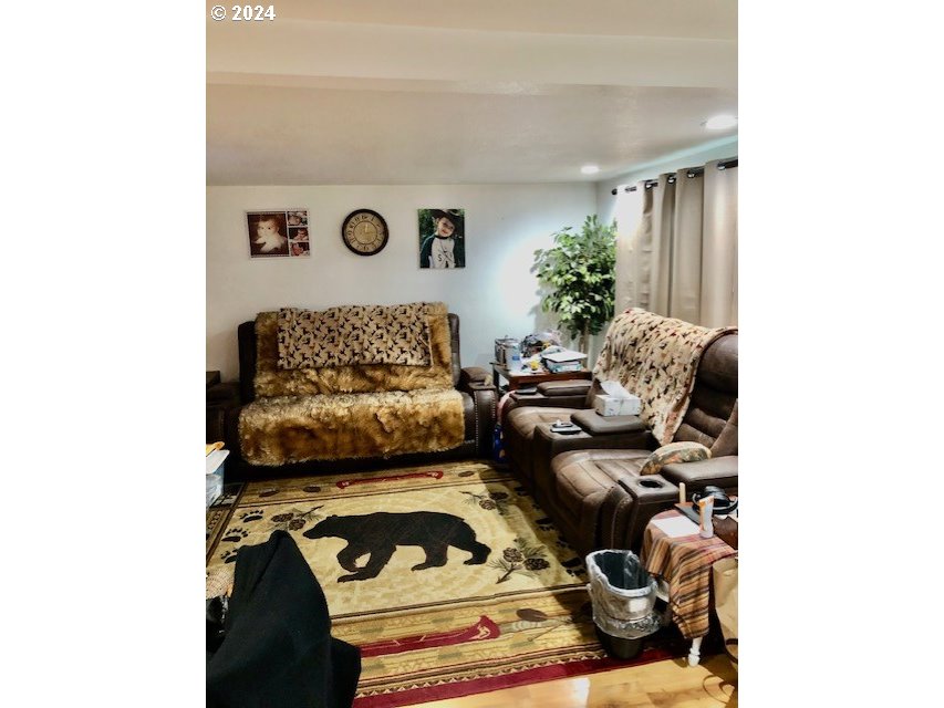 260 North 23rd Street Springfield, OR 97477 - Photo 2 of 16 a bedroom with a bed and a couch