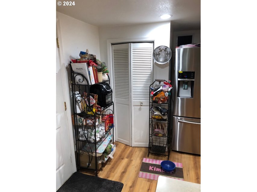 260 North 23rd Street Springfield, OR 97477 - Photo 5 of 16 a view of a hallway with wooden floor
