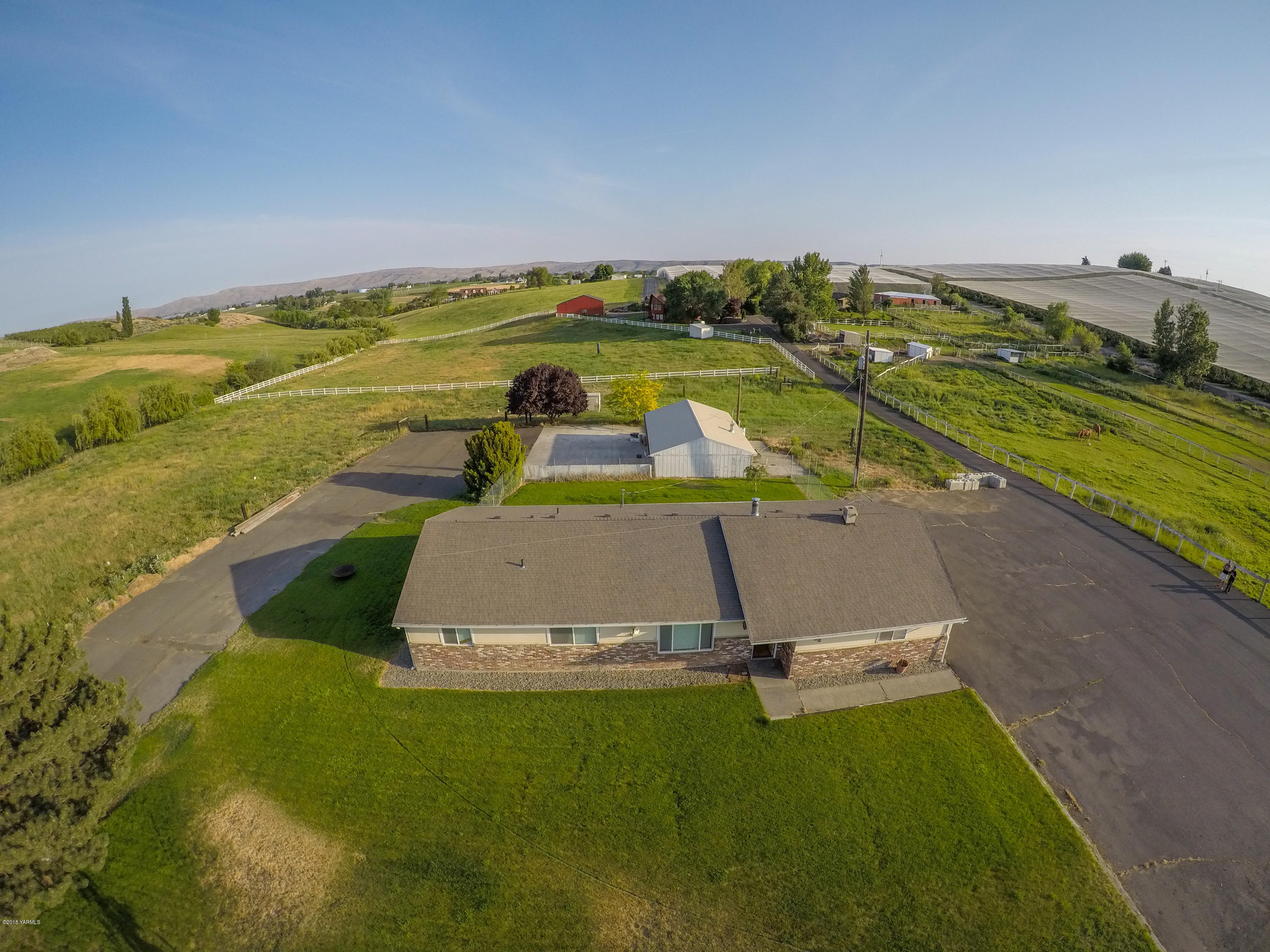 13406 Summitview Ext Road Yakima, WA 98908 - Photo 2 of 26 an aerial view of a house with a yard