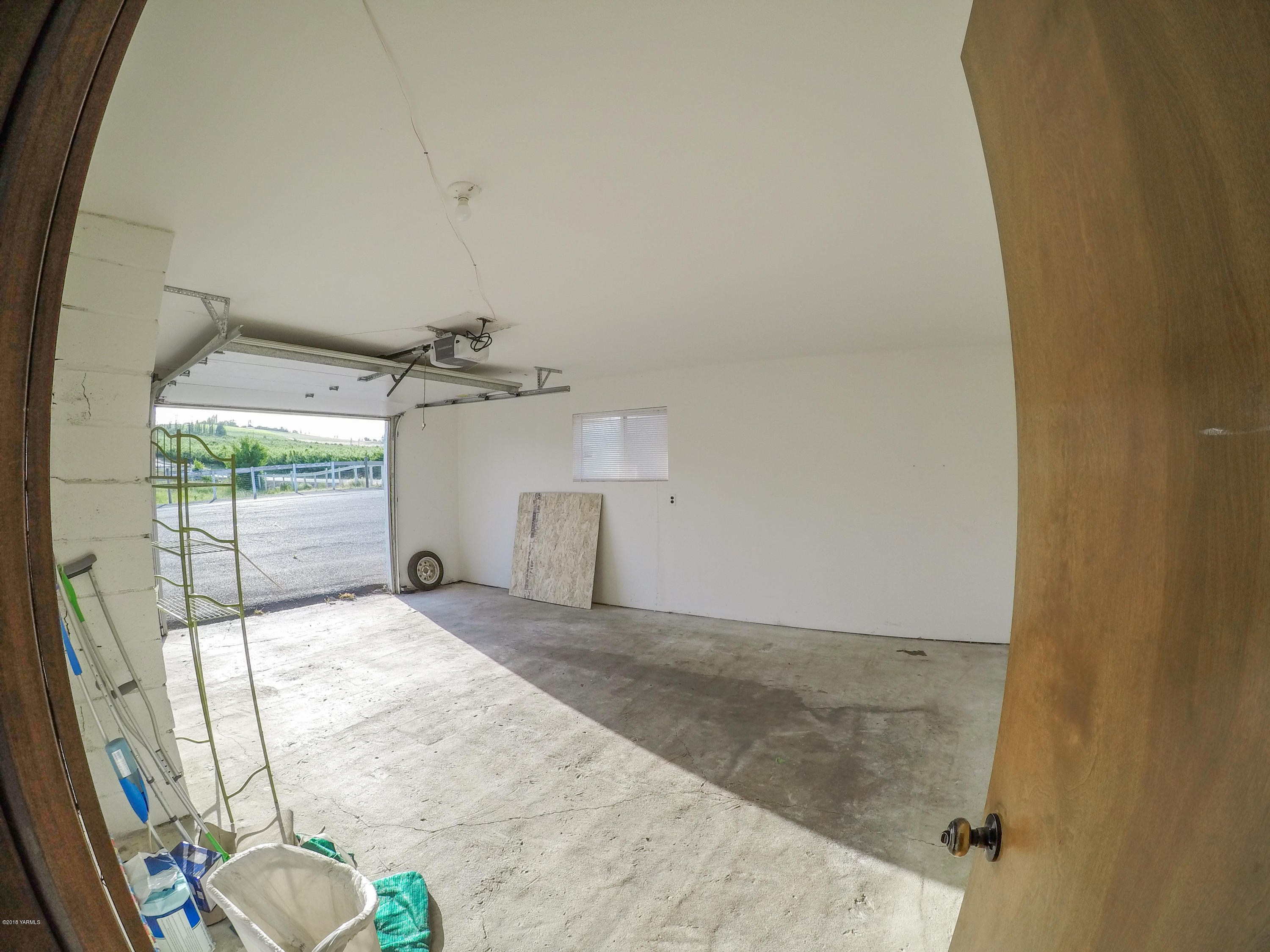 13406 Summitview Ext Road Yakima, WA 98908 - Photo 12 of 26 a view of a room with wooden floor and windows