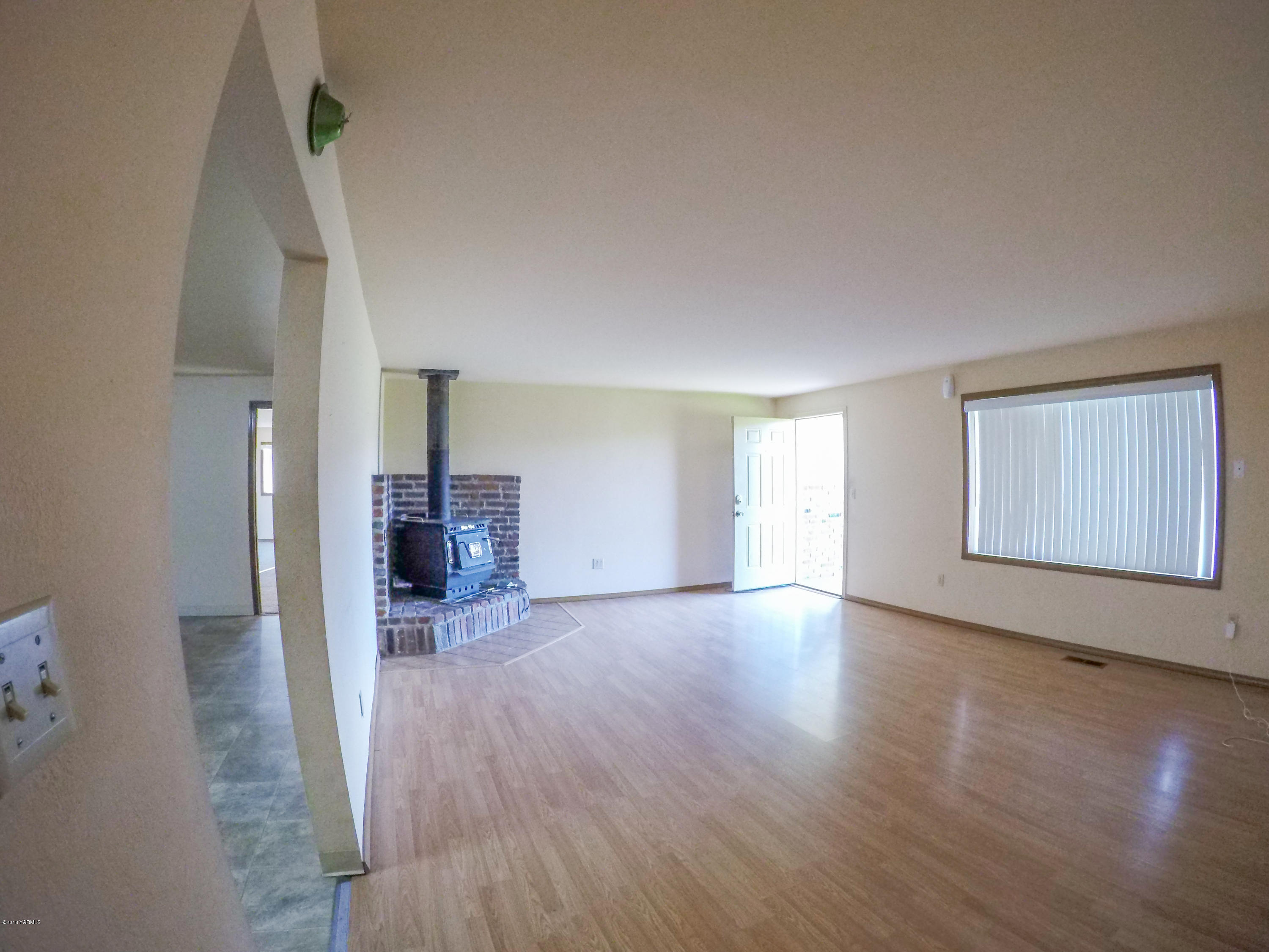 13406 Summitview Ext Road Yakima, WA 98908 - Photo 8 of 26 a view of empty room with wooden floor