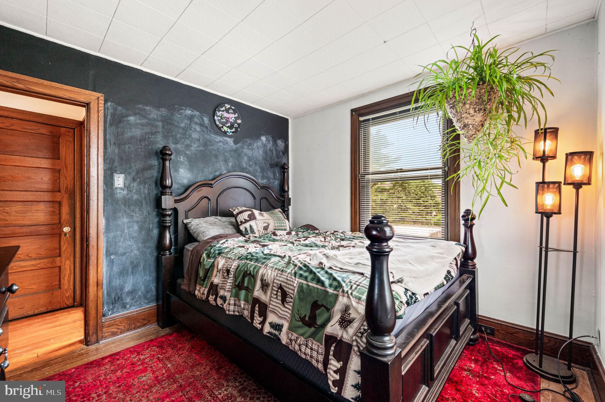 3 Township Line Road Elkins Park, PA 19027 - Photo 26 of 40 Charming bedroom with rustic accents.