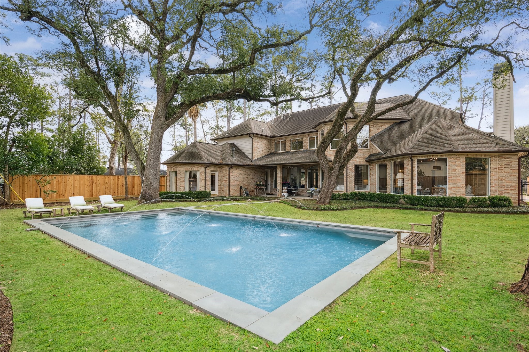 11524 Taylorcrest Road Houston, TX 77024 - Photo 43 of 47 A beautiful New England–style heated rectangular pool, measuring 40' x 22', was built by Vollmer in 2013. Surrounded by bluestone, it features six adjustable copper water spouts that add both tranquility and elegance.
