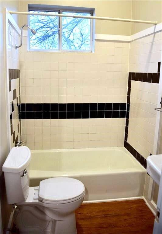 611 Nelray Boulevard, Unit B Austin, TX 78751 - Photo 4 of 11 a bathroom with a sink a toilet and bathtub