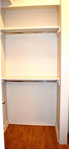 a bathroom with a sink a mirror and vanity